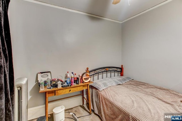 162 Summer St, Orange, NJ 07050 - bedroom with ornamental molding, baseboards, a ceiling fan, and radiator