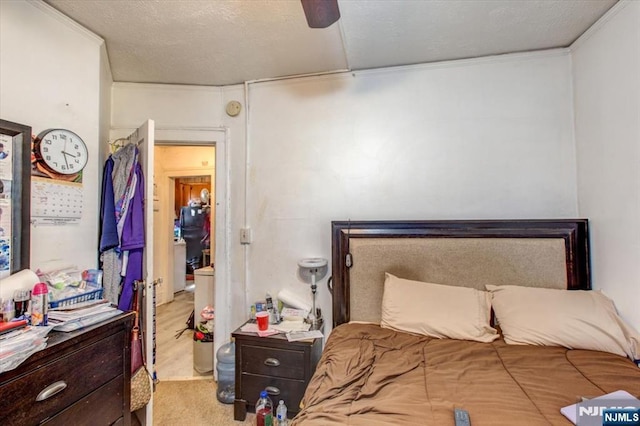 162 Summer St, Orange, NJ 07050 - bedroom with a textured ceiling, wood finished floors, and a ceiling fan
