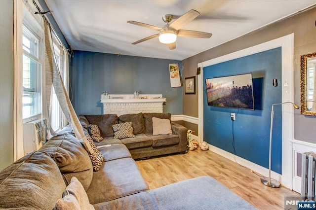 162 Summer St, Orange, NJ 07050 - living area with cooling unit, ceiling fan, baseboards, and wood finished floors