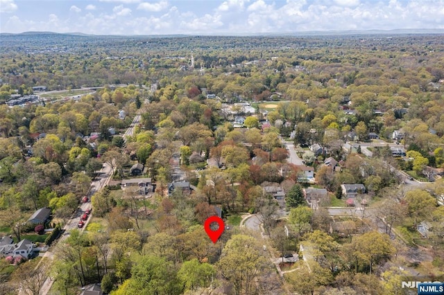 aerial view featuring a view of trees
