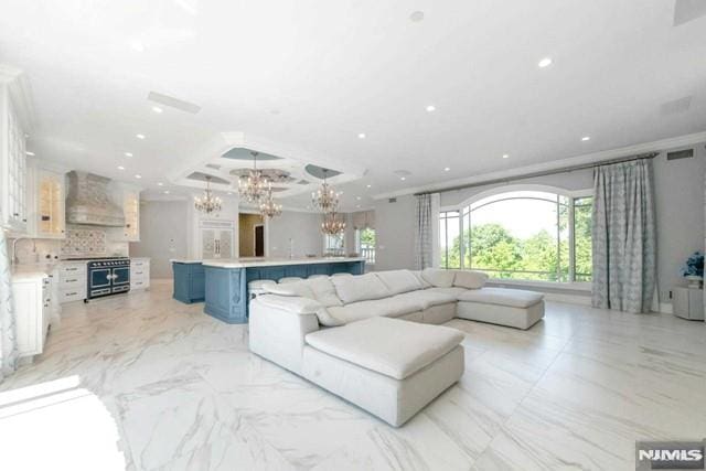 16 Shinnecock Trl, Franklin Lakes, NJ 07417 - living room featuring visible vents, recessed lighting, ornamental molding, and a chandelier