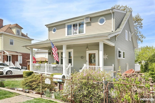 view of front of home featuring covered porch