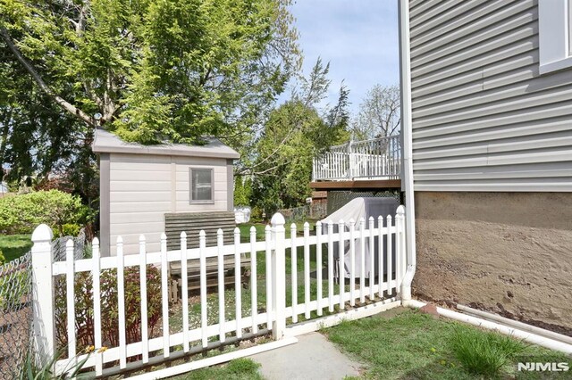 view of side of property with fence