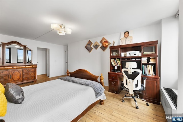 bedroom featuring light wood finished floors