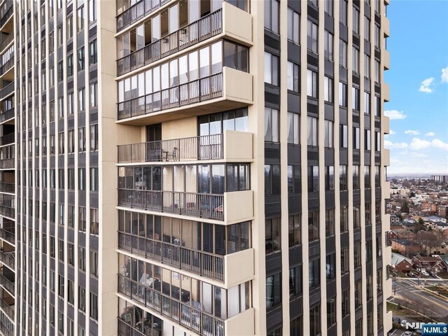 view of building exterior with a city view