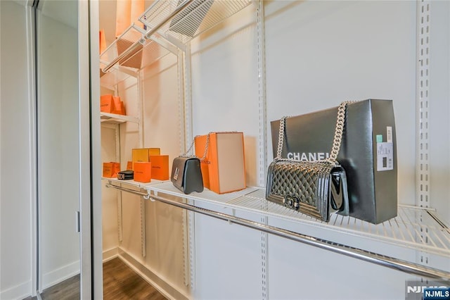 2077 Center Ave Unit 11C, Fort Lee, NJ 07024 - walk in closet with dark wood-type flooring