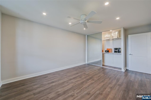 2077 Center Ave Unit 11C, Fort Lee, NJ 07024 - unfurnished bedroom with dark wood-type flooring, recessed lighting, a closet, baseboards, and ceiling fan