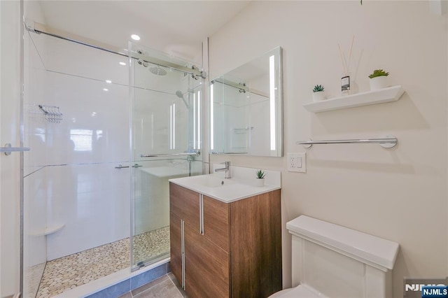 2077 Center Ave Unit 11C, Fort Lee, NJ 07024 - full bathroom featuring toilet, vanity, and an enclosed shower