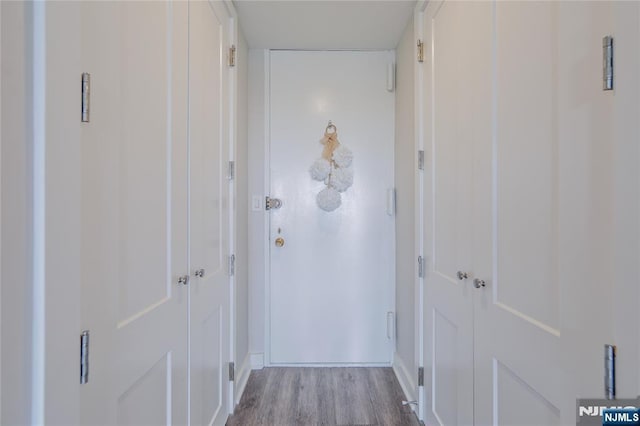 2077 Center Ave Unit 11C, Fort Lee, NJ 07024 - corridor featuring wood finished floors and baseboards