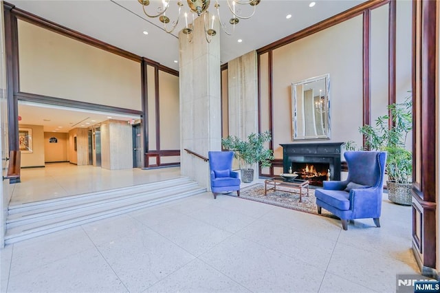 2077 Center Ave Unit 11C, Fort Lee, NJ 07024 - community lobby with a towering ceiling, crown molding, and recessed lighting