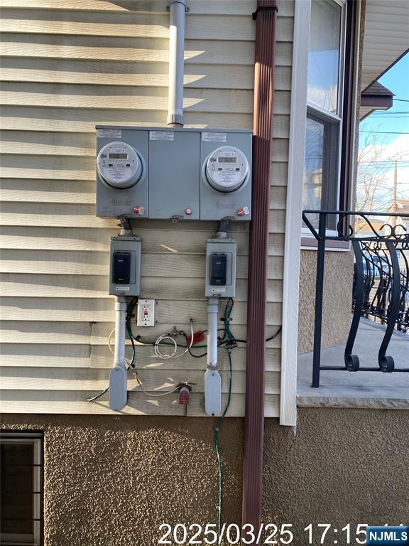 exterior details featuring electric meter