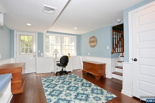 office area featuring a wainscoted wall, wood-type flooring, and recessed lighting