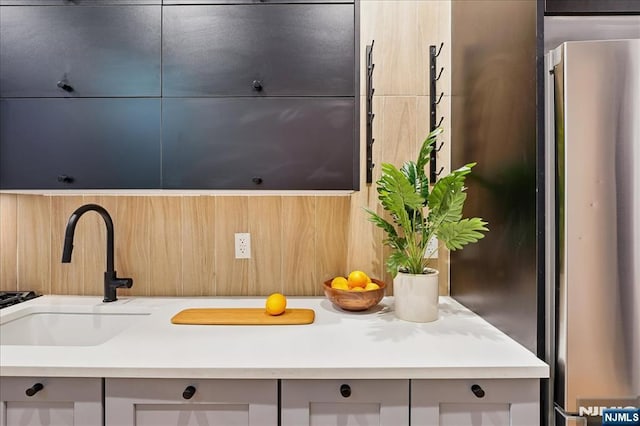 interior space featuring light countertops and a sink
