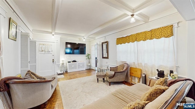 living area featuring coffered ceiling and beam ceiling