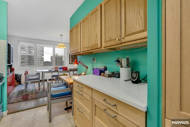 2000 Linwood Ave Unit 12S, Fort Lee, NJ 07024 - kitchen featuring light countertops, hanging light fixtures, and light brown cabinetry
