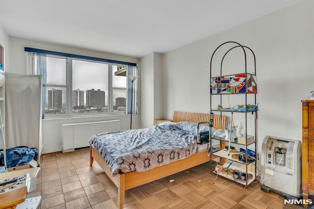 2000 Linwood Ave Unit 12S, Fort Lee, NJ 07024 - bedroom featuring radiator