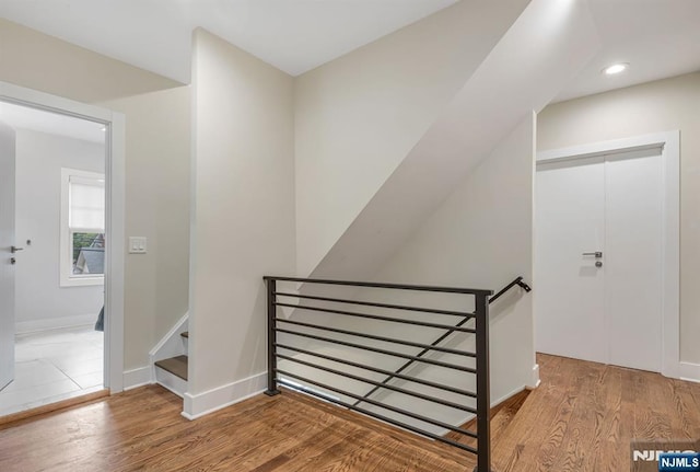 334 Durie Ave, Closter, NJ 07624 - stairway with wood finished floors, baseboards, and recessed lighting