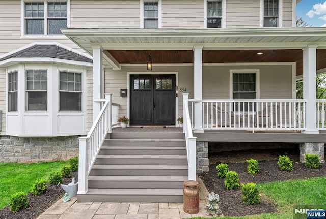 334 Durie Ave, Closter, NJ 07624 - view of exterior entry with a porch