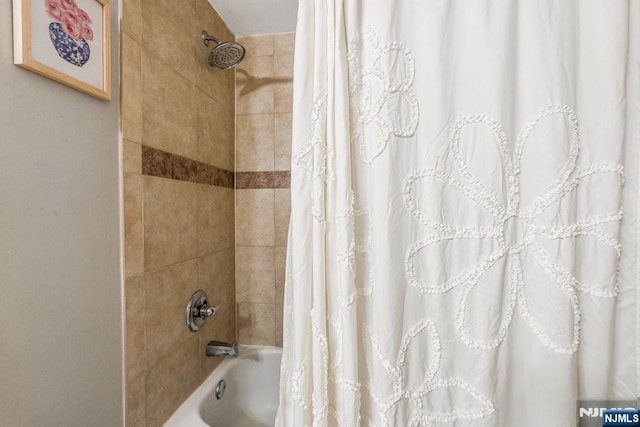 full bathroom with shower / tub combo
