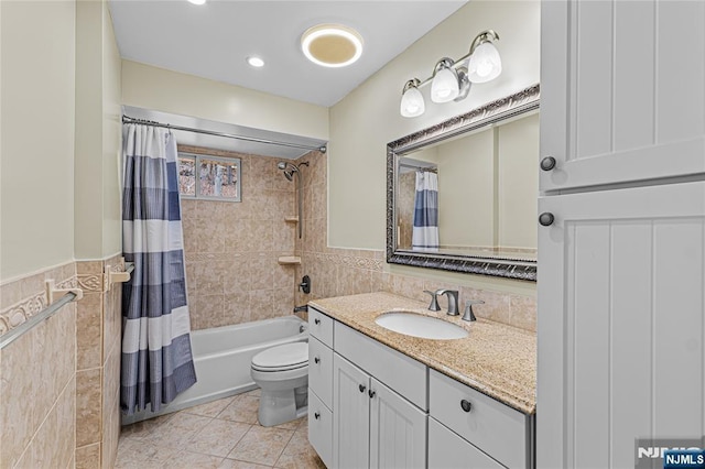 55 N Hillside Ave, Roxbury Township, NJ 07847 - full bathroom featuring toilet, tile walls, vanity, a wainscoted wall, and tile patterned flooring