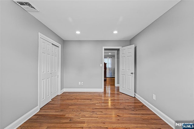 55 N Hillside Ave, Roxbury Township, NJ 07847 - unfurnished bedroom with visible vents, baseboards, recessed lighting, and wood finished floors