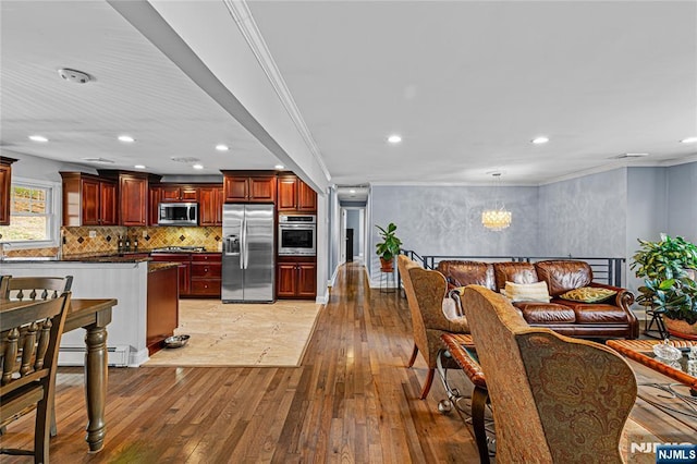 55 N Hillside Ave, Roxbury Township, NJ 07847 - living area featuring a chandelier, recessed lighting, light wood-type flooring, and ornamental molding