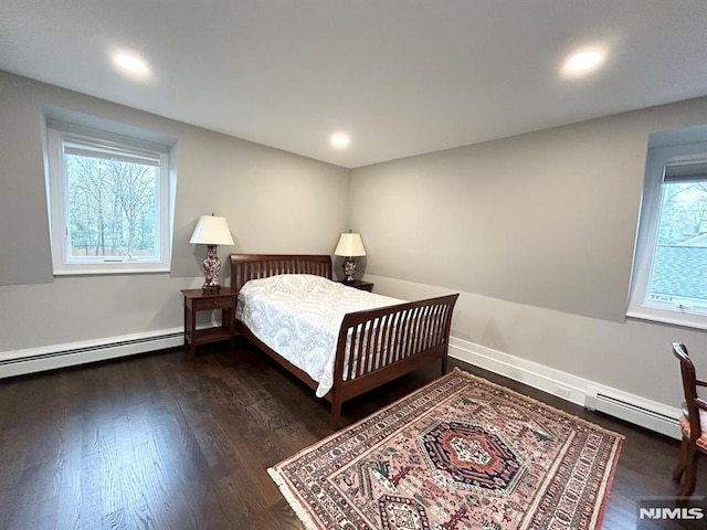 126 Closter Dock Rd, Closter, NJ 07624 - bedroom with a baseboard radiator, wood finished floors, and recessed lighting