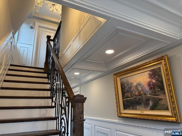 126 Closter Dock Rd, Closter, NJ 07624 - stairs featuring a decorative wall, wainscoting, coffered ceiling, and ornamental molding