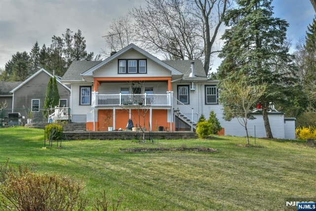 279 Boonton Ave, Butler Borough, NJ 07405 - back of house with stairway, a yard, and ceiling fan