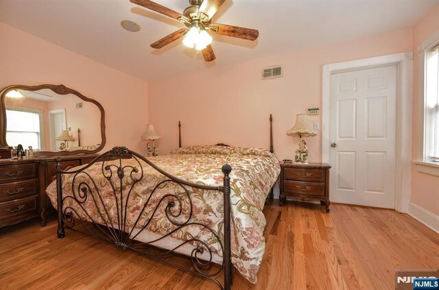 279 Boonton Ave, Butler Borough, NJ 07405 - bedroom with ceiling fan, baseboards, visible vents, and light wood-style flooring