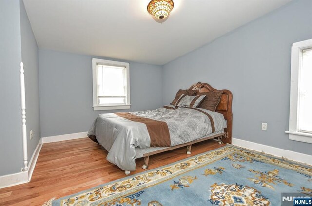 279 Boonton Ave, Butler Borough, NJ 07405 - bedroom featuring wood finished floors and baseboards