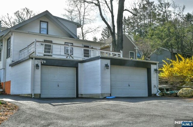 279 Boonton Ave, Butler Borough, NJ 07405 - view of front of property featuring an attached garage and driveway