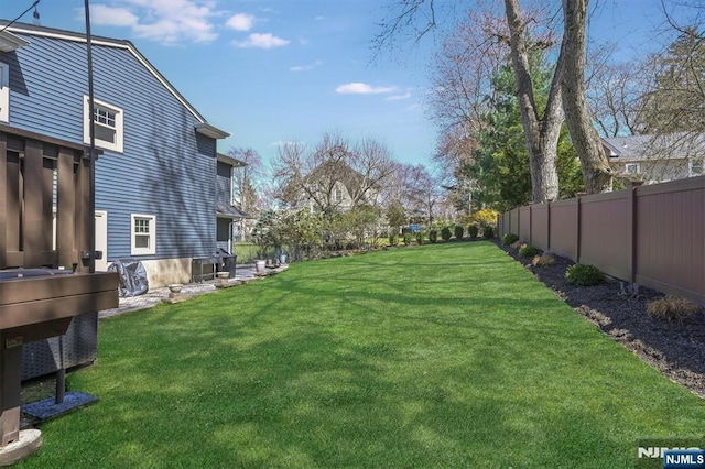 view of yard with fence