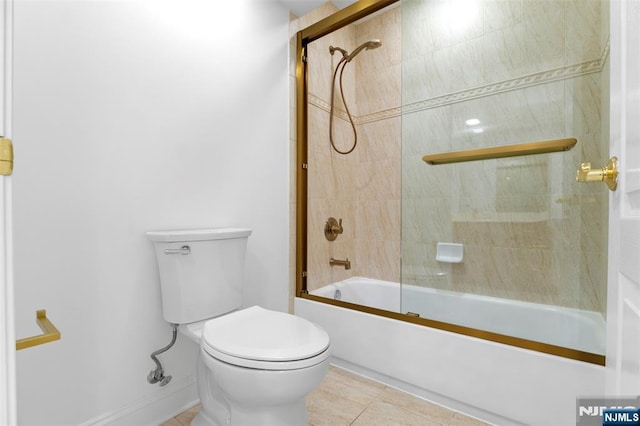 full bath featuring toilet, shower / tub combination, and tile patterned flooring