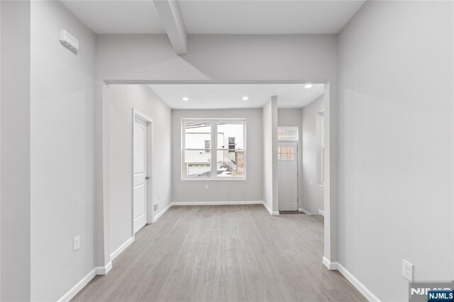 1457 67th St, North Bergen, NJ 07047 - hallway featuring beam ceiling, light wood-style flooring, recessed lighting, and baseboards