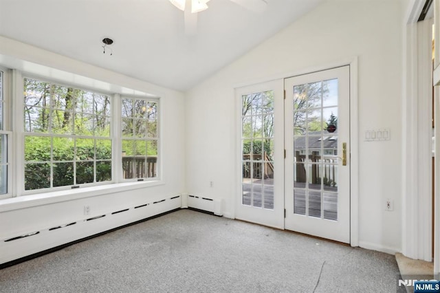 spare room featuring a baseboard radiator, ceiling fan, lofted ceiling, and carpet flooring