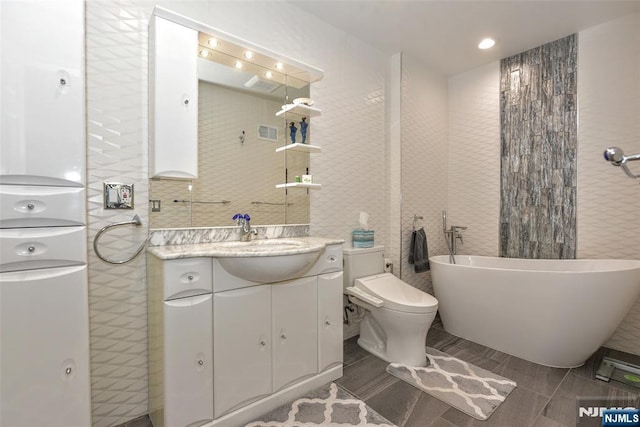 9 Peach Hill Ct, Ramsey, NJ 07446 - full bath with a freestanding bath, vanity, and toilet
