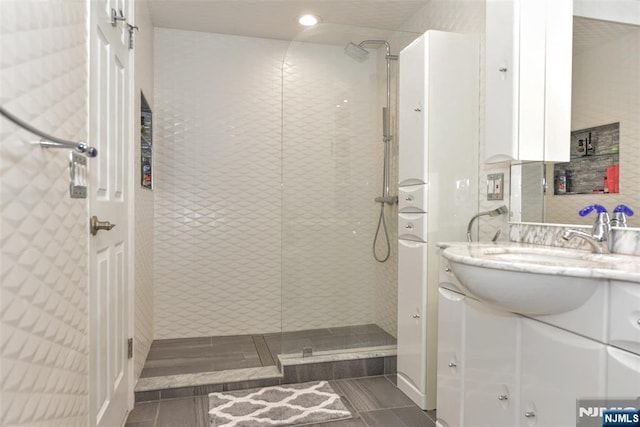 9 Peach Hill Ct, Ramsey, NJ 07446 - bathroom with a walk in shower, vanity, and recessed lighting