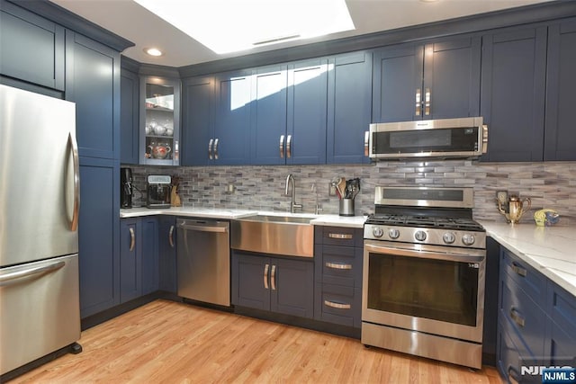 9 Peach Hill Ct, Ramsey, NJ 07446 - kitchen with appliances with stainless steel finishes, a sink, blue cabinetry, and recessed lighting