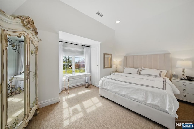 carpeted bedroom with baseboards, vaulted ceiling, visible vents, and recessed lighting