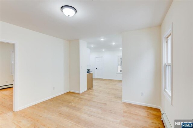 546 Morris St, Orange, NJ 07050 - empty room featuring baseboards, light wood finished floors, and recessed lighting
