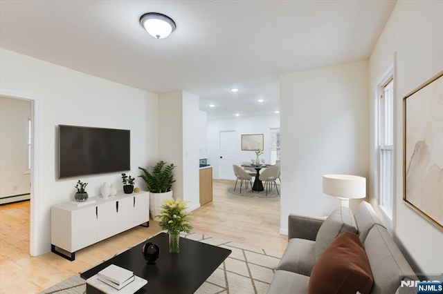 546 Morris St, Orange, NJ 07050 - living room with light wood finished floors and recessed lighting