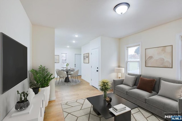 546 Morris St, Orange, NJ 07050 - living area with recessed lighting and light wood-style floors