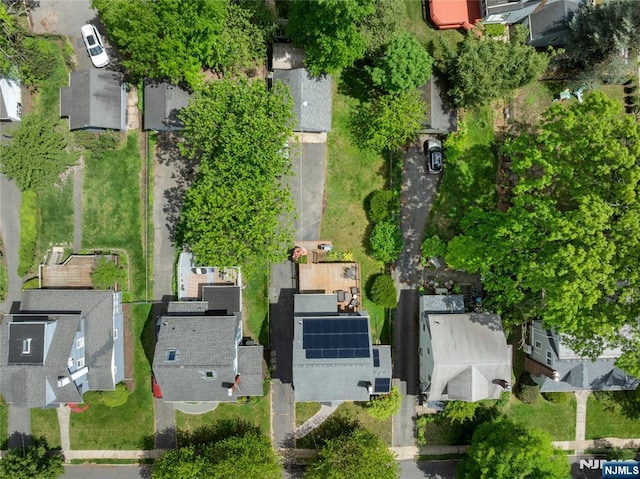 aerial view of property's location with nearby suburban area