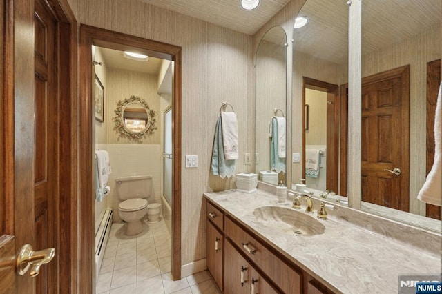 full bathroom featuring tile patterned flooring, toilet, wallpapered walls, vanity, and baseboards