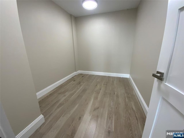 300 Winston Dr Unit 1722, Cliffside Park, NJ 07010 - unfurnished room featuring light wood-style floors and baseboards