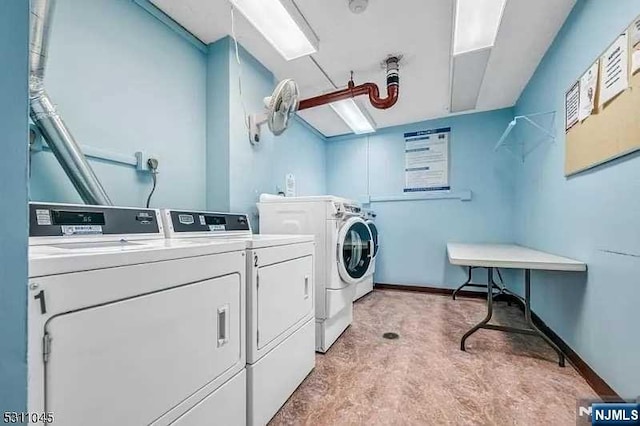 300 Winston Dr Unit 1722, Cliffside Park, NJ 07010 - community laundry room featuring independent washer and dryer and light colored carpet