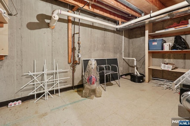 unfinished basement with tile patterned floors