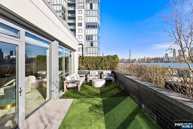 exterior space with a view of city and a water view