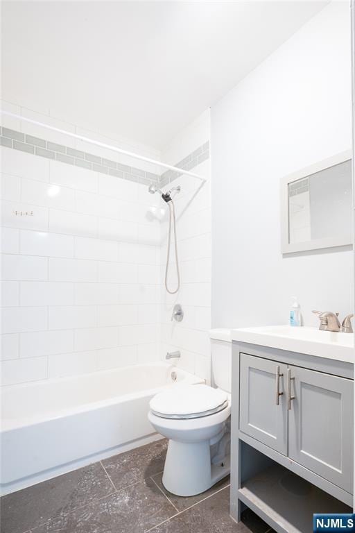 110 Montgomery St, Paterson, NJ 07501 - bathroom with vanity, shower / tub combination, and toilet